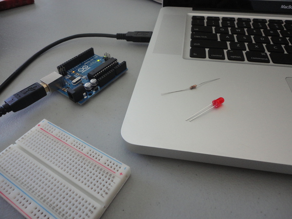 Arduino microcontroller with a laptop computer